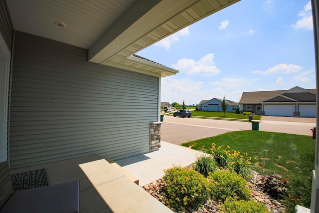 1267 Naser Way, New Richmond, WI 54017 - view of patio featuring a residential view