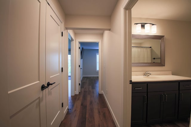 1267 Naser Way, New Richmond, WI 54017 - hallway featuring dark wood-style floors and a sink