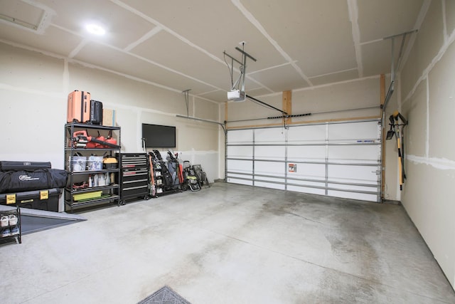 1267 Naser Way, New Richmond, WI 54017 - garage featuring a garage door opener