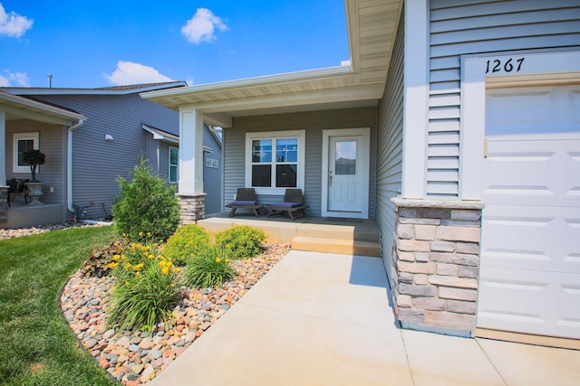 1267 Naser Way, New Richmond, WI 54017 - entrance to property with a porch and a garage