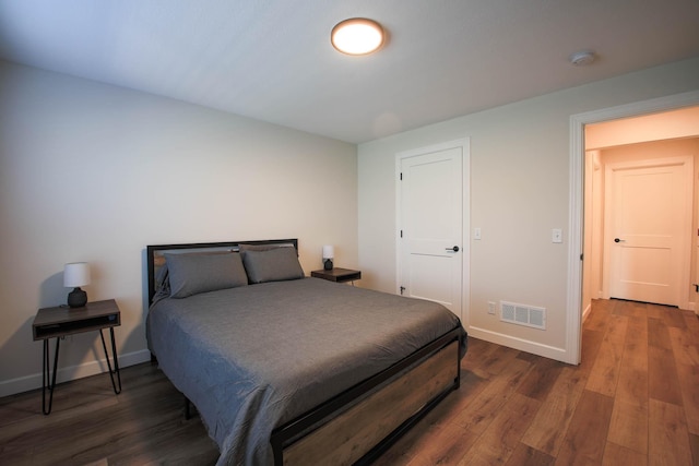 1267 Naser Way, New Richmond, WI 54017 - bedroom featuring baseboards and dark wood-type flooring