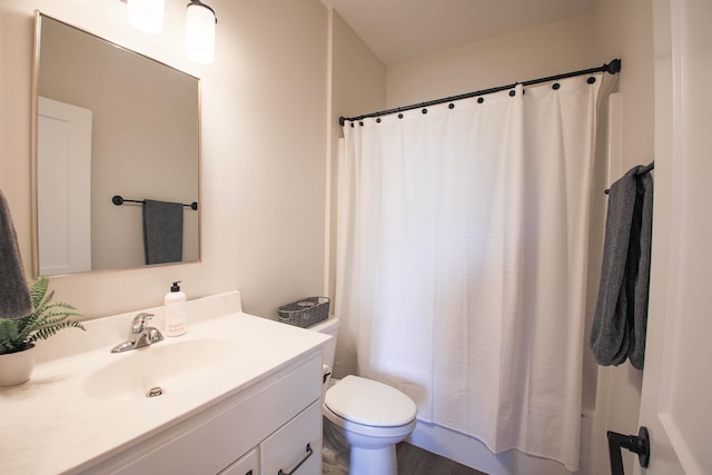 1267 Naser Way, New Richmond, WI 54017 - bathroom with vanity, shower / bath combo with shower curtain, and wood finished floors