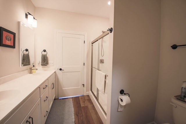 1267 Naser Way, New Richmond, WI 54017 - full bathroom with wood finished floors, a shower stall, and double vanity