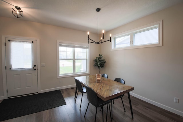 1267 Naser Way, New Richmond, WI 54017 - dining space with a chandelier and dark wood finished floors