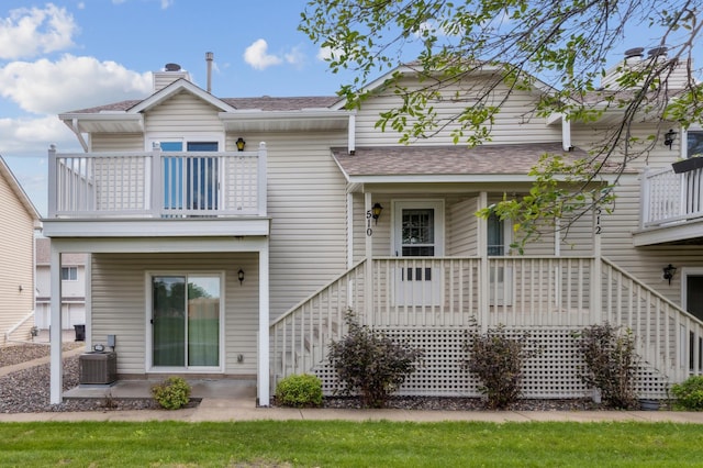 510 78th Ave NE, Spring Lake Park, MN 55432 - rear view of house with a balcony, roof with shingles, and stairs