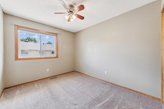 510 78th Ave NE, Spring Lake Park, MN 55432 - carpeted spare room with ceiling fan and a textured ceiling