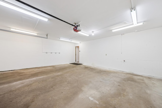 510 78th Ave NE, Spring Lake Park, MN 55432 - garage featuring a garage door opener