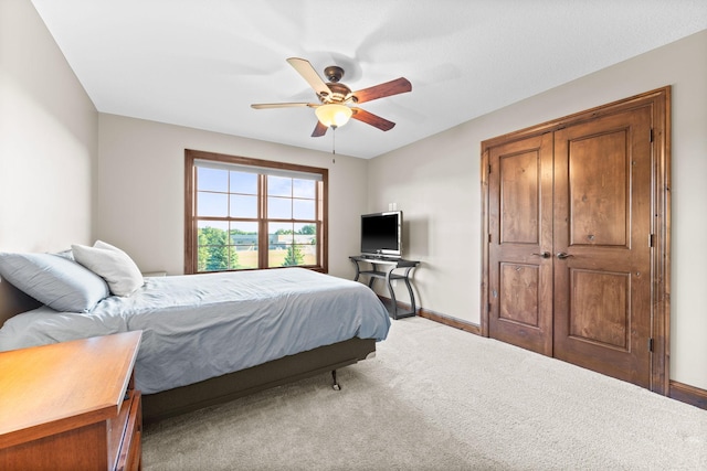 1899 White Oak Dr, Chaska, MN 55318 - carpeted bedroom featuring baseboards and ceiling fan