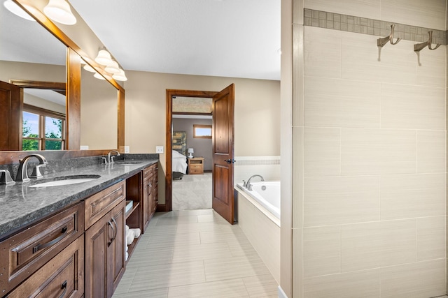 1899 White Oak Dr, Chaska, MN 55318 - ensuite bathroom featuring double vanity, a garden tub, and tile patterned floors