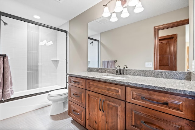 1899 White Oak Dr, Chaska, MN 55318 - bathroom featuring vanity and enclosed tub / shower combo