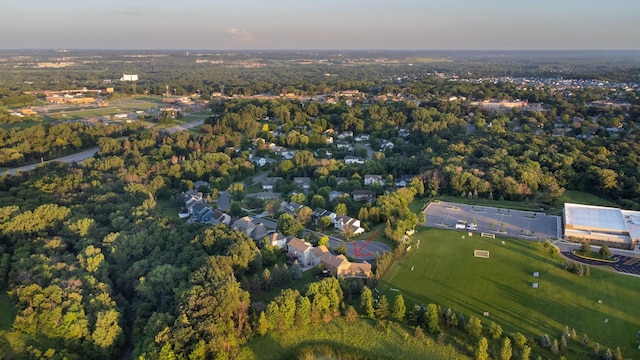 1899 White Oak Dr, Chaska, MN 55318 - aerial view of property and surrounding area with a heavily wooded area
