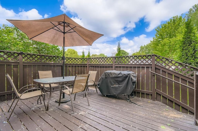 7236 Clear Rdg, Centerville, MN 55038 - deck featuring a grill and outdoor dining area