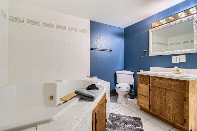 7236 Clear Rdg, Centerville, MN 55038 - bathroom featuring a tub with jets, tile patterned floors, vanity, and a textured wall