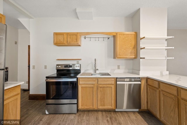 727 Virginia St, Saint Paul, MN 55103 - kitchen with appliances with stainless steel finishes, light wood finished floors, light countertops, and open shelves