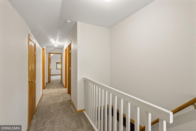727 Virginia St, Saint Paul, MN 55103 - corridor featuring carpet and an upstairs landing