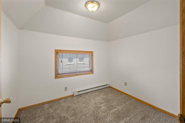 727 Virginia St, Saint Paul, MN 55103 - carpeted empty room featuring a baseboard radiator and lofted ceiling