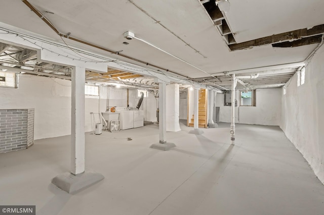 727 Virginia St, Saint Paul, MN 55103 - basement featuring washer and clothes dryer and a sink