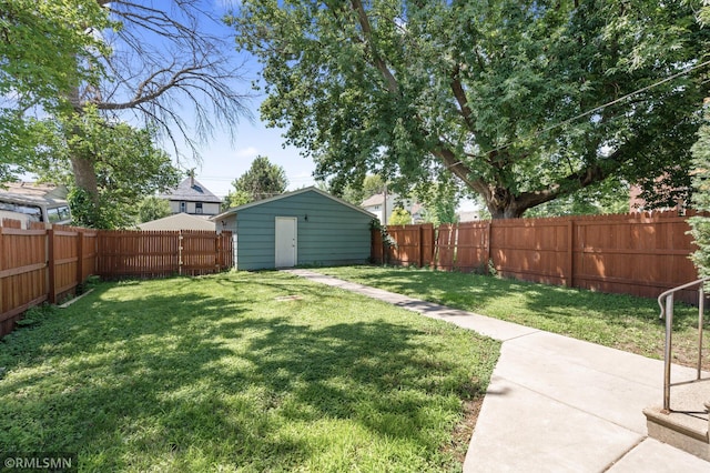 727 Virginia St, Saint Paul, MN 55103 - fenced backyard featuring a storage shed and a patio