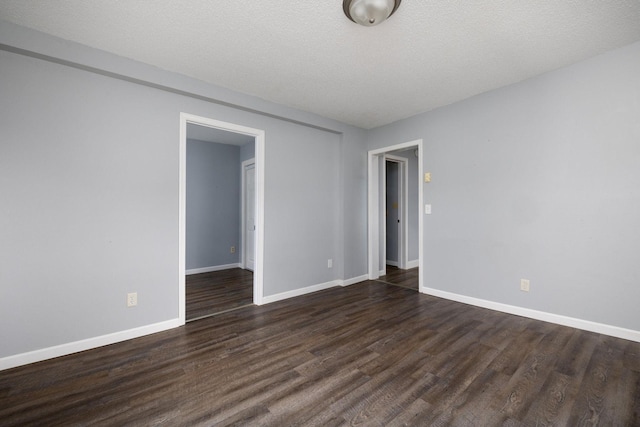 213 Caledonia St, Caledonia, MN 55921 - empty room with dark wood-type flooring