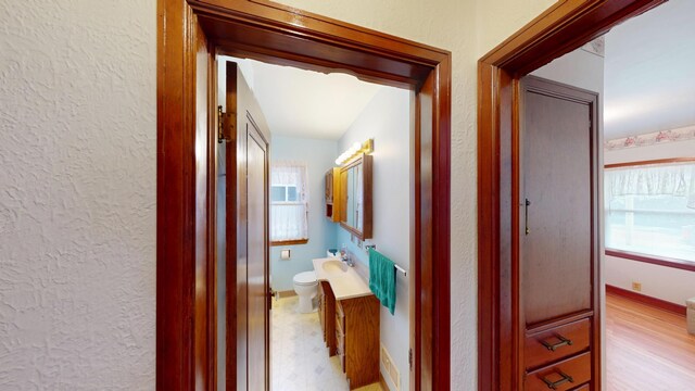 1314 Dunham St, Albert Lea, MN 56007 - corridor with a textured wall and light floors