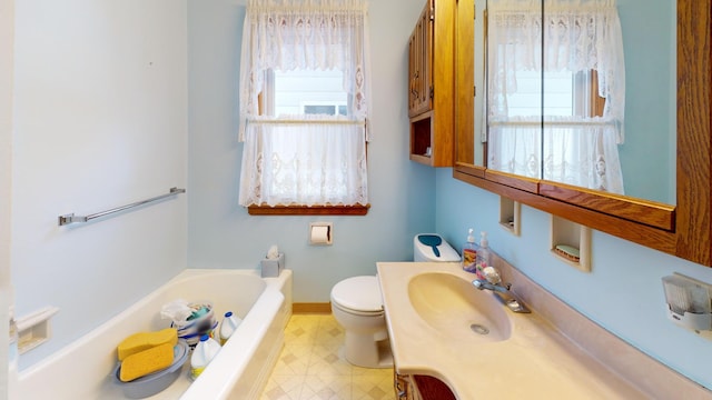 1314 Dunham St, Albert Lea, MN 56007 - bathroom featuring a bath, vanity, and tile patterned floors