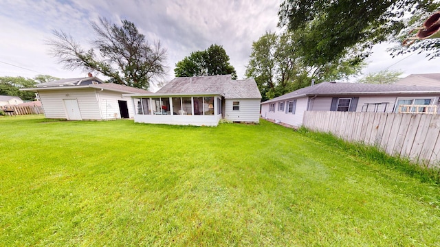 1314 Dunham St, Albert Lea, MN 56007 - rear view of property with a sunroom