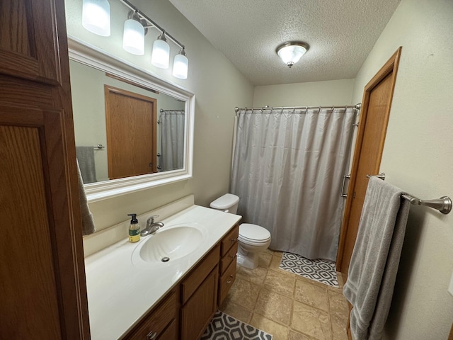 1070 20th St NE, Owatonna, MN 55060 - bathroom featuring vanity, a textured ceiling, and a shower with shower curtain