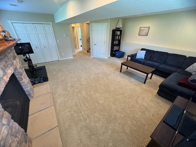 1070 20th St NE, Owatonna, MN 55060 - carpeted living area featuring a stone fireplace and stairs