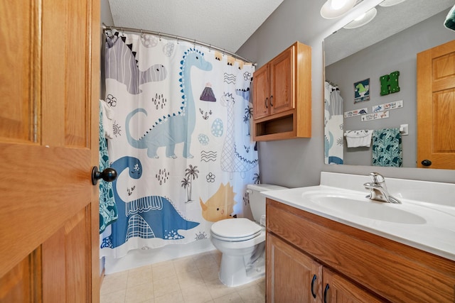 2418 Thrush St, Shakopee, MN 55379 - bathroom featuring vanity, a textured ceiling, and tile patterned flooring