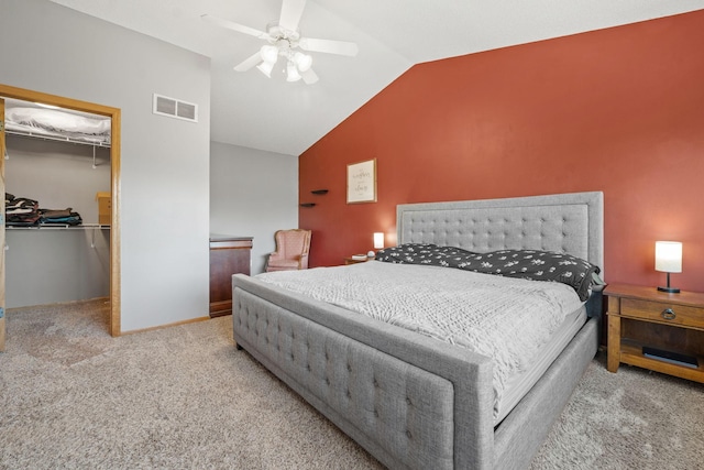 2418 Thrush St, Shakopee, MN 55379 - bedroom featuring carpet floors, vaulted ceiling, a walk in closet, ceiling fan, and a closet