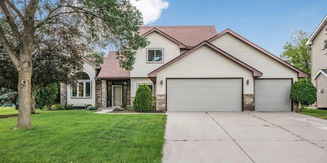 2824 92nd Cres N, Brooklyn Park, MN 55443 - view of front of property featuring a front lawn, driveway, a garage, and stone siding