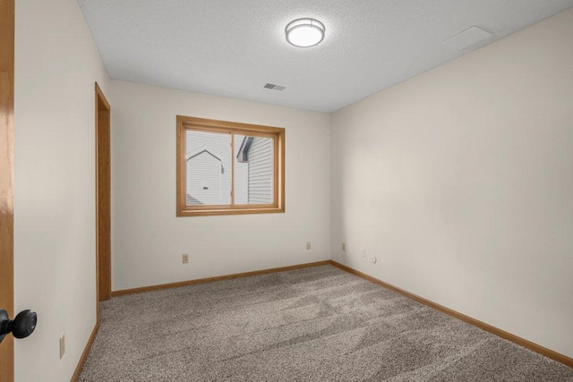 2824 92nd Cres N, Brooklyn Park, MN 55443 - carpeted empty room with a textured ceiling and baseboards