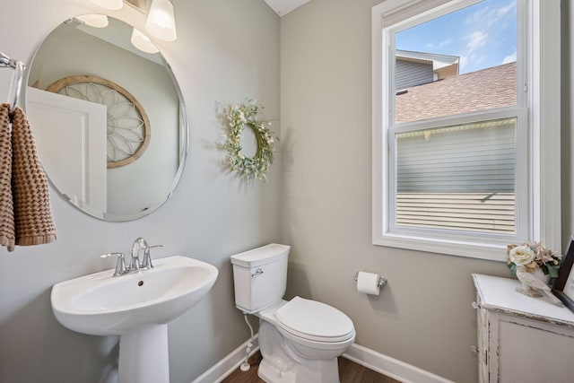 12745 39th St NE, Saint Michael, MN 55376 - bathroom with baseboards and wood finished floors