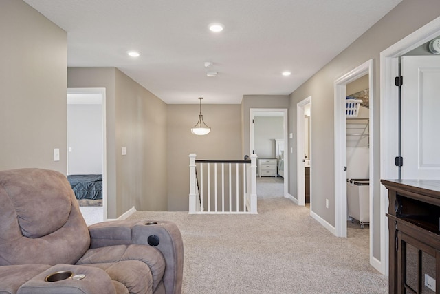 12745 39th St NE, Saint Michael, MN 55376 - living area with an upstairs landing, light carpet, and recessed lighting