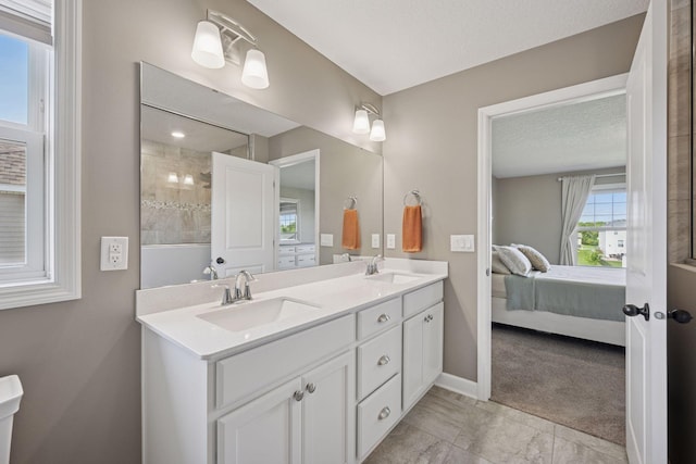 12745 39th St NE, Saint Michael, MN 55376 - bathroom featuring double vanity and ensuite bathroom