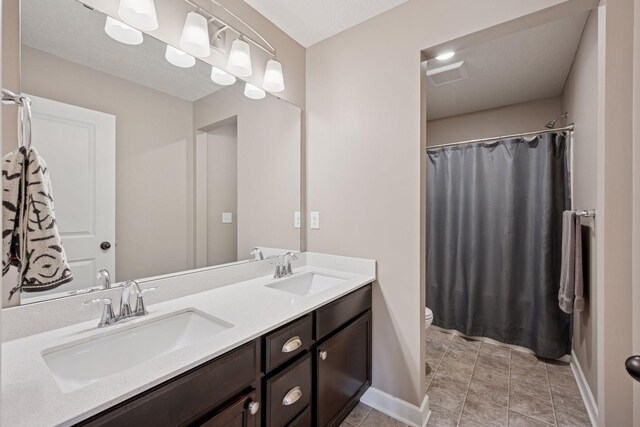 12745 39th St NE, Saint Michael, MN 55376 - bathroom with double vanity and a shower with curtain