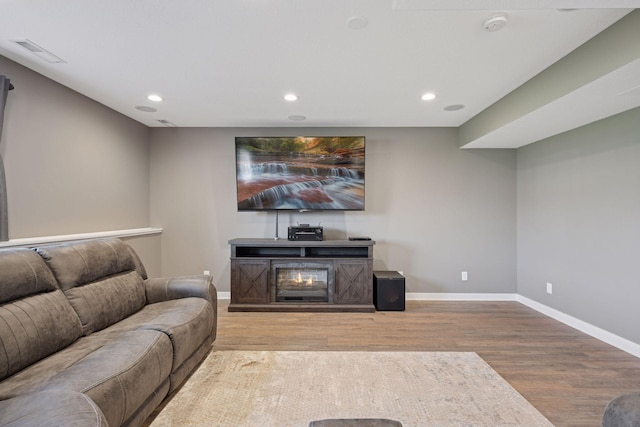 12745 39th St NE, Saint Michael, MN 55376 - living area with wood finished floors, recessed lighting, and a fireplace