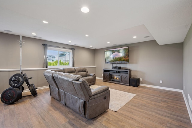 12745 39th St NE, Saint Michael, MN 55376 - living room featuring wood finished floors and recessed lighting