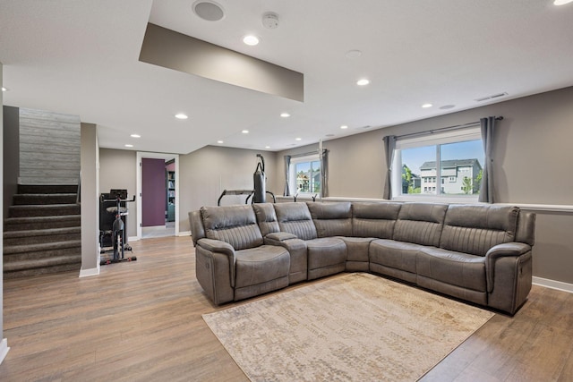 12745 39th St NE, Saint Michael, MN 55376 - living room featuring light wood-style floors, stairway, and recessed lighting