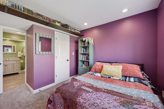 12745 39th St NE, Saint Michael, MN 55376 - carpeted bedroom with recessed lighting and ensuite bath