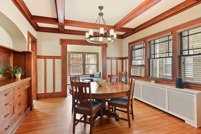 3343 Humboldt Ave S, Minneapolis, MN 55408 - dining space featuring radiator, coffered ceiling, a chandelier, light wood finished floors, and beam ceiling