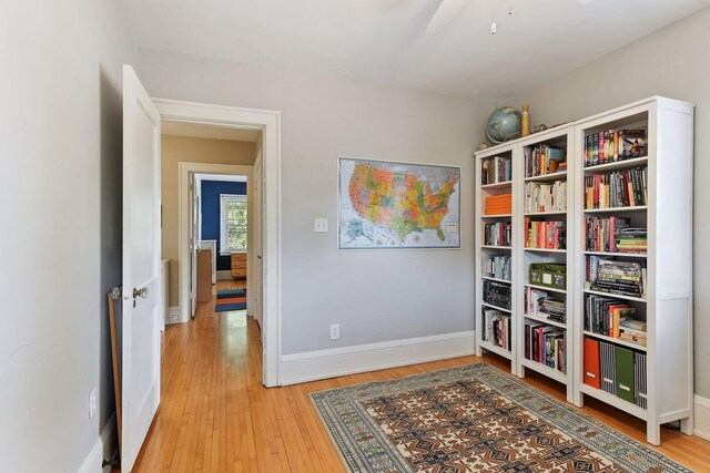 3343 Humboldt Ave S, Minneapolis, MN 55408 - sitting room with light wood-style floors and ceiling fan