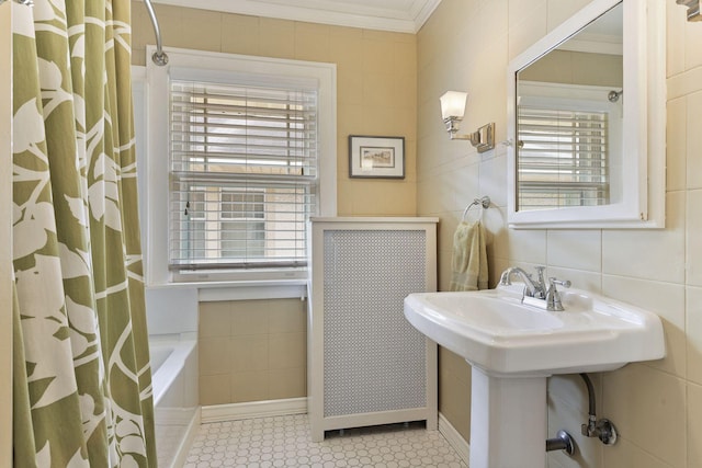 3343 Humboldt Ave S, Minneapolis, MN 55408 - full bathroom with tile walls, crown molding, and shower / bath combo