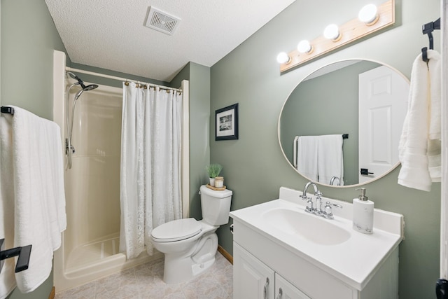 11810 191 1/2 Ave NW, Elk River, MN 55330 - bathroom with vanity, a shower with curtain, a textured ceiling, and tile patterned floors