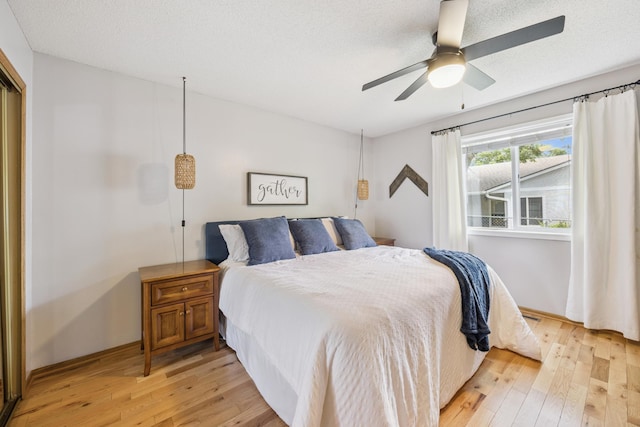 11810 191 1/2 Ave NW, Elk River, MN 55330 - bedroom with light wood-style flooring and a ceiling fan