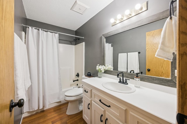 11810 191 1/2 Ave NW, Elk River, MN 55330 - bathroom featuring vanity, wood finished floors, and shower / bath combo with shower curtain