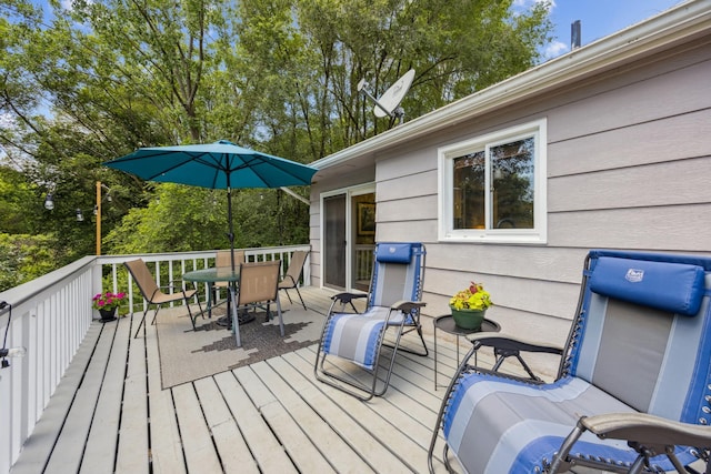 11810 191 1/2 Ave NW, Elk River, MN 55330 - wooden deck featuring outdoor dining area