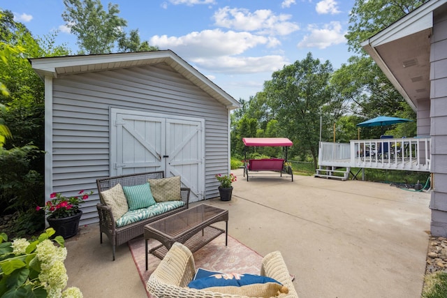 11810 191 1/2 Ave NW, Elk River, MN 55330 - view of patio with a storage shed, an outdoor living space, and a wooden deck