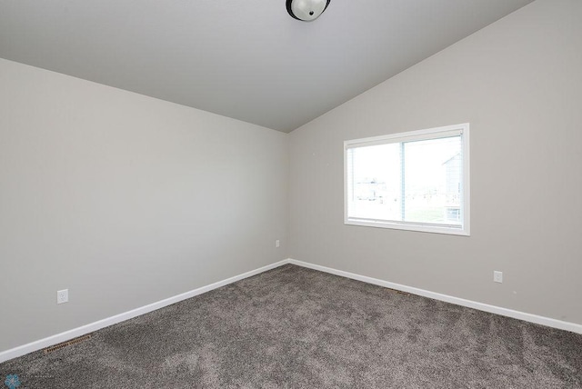 1040 Barnes Dr, West Fargo, ND 58078 - empty room with vaulted ceiling and dark colored carpet