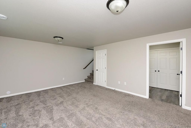 1040 Barnes Dr, West Fargo, ND 58078 - carpeted spare room with baseboards and stairs
